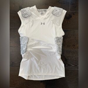 Under armor padded football shirt. NWOT. Size XL